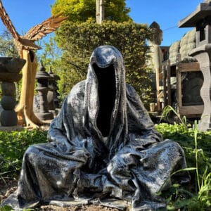 Sitzender Wächter der Zeit