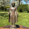 stehender buddha aus bronze